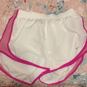 white and pink nike dri-fit running shorts, large